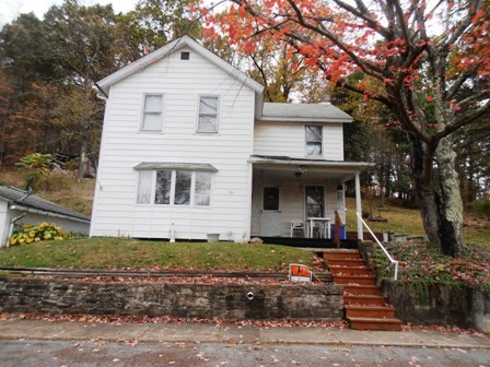 20 Upper Seldon Avenue Oil City, PA 16301 - Photo 1 of 1 a front view of a house with a yard