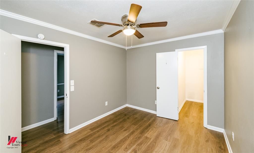 198 7 Pines Road Benton, LA 71006 - Photo 20 of 30 a view of room with wooden floor and ceiling fan