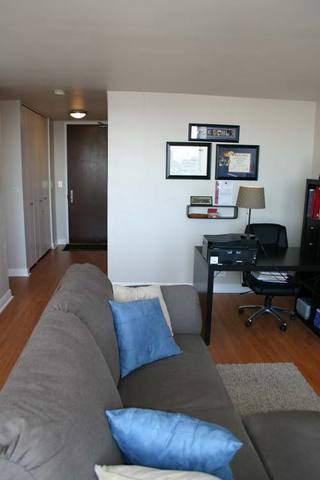 655 West Irving Park Road, Unit 5209 Chicago, IL 60613 - Photo 4 of 15 a workspace with furniture and window