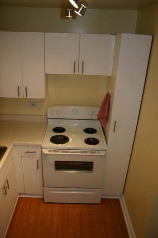 655 West Irving Park Road, Unit 5209 Chicago, IL 60613 - Photo 5 of 15 a utility room with dryer and washer