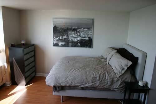 655 West Irving Park Road, Unit 5209 Chicago, IL 60613 - Photo 8 of 15 a bedroom with a bed and wall painting