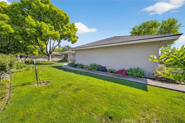 a backyard of a house with lots of green space