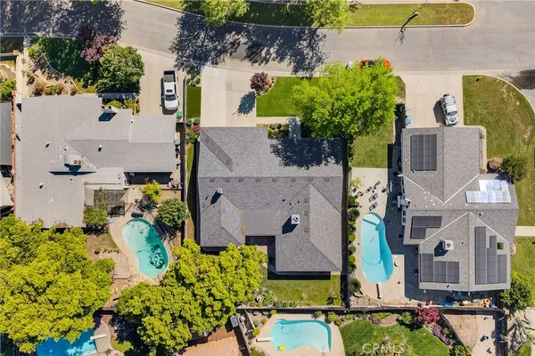 aerial view of multiple houses with outdoor space