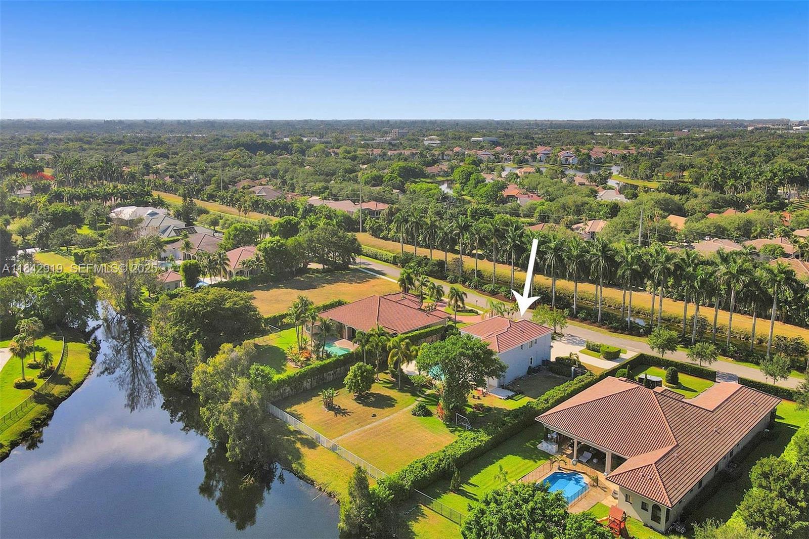 721 Ranch Road Weston, FL 33326 - Photo 21 of 38 an aerial view of residential houses with outdoor space