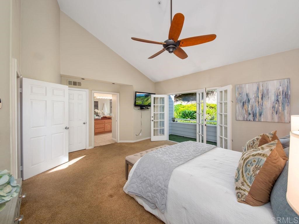960 Valley Avenue Solana Beach, CA 92075 - Photo 18 of 51 a bed room with a bed and a large window