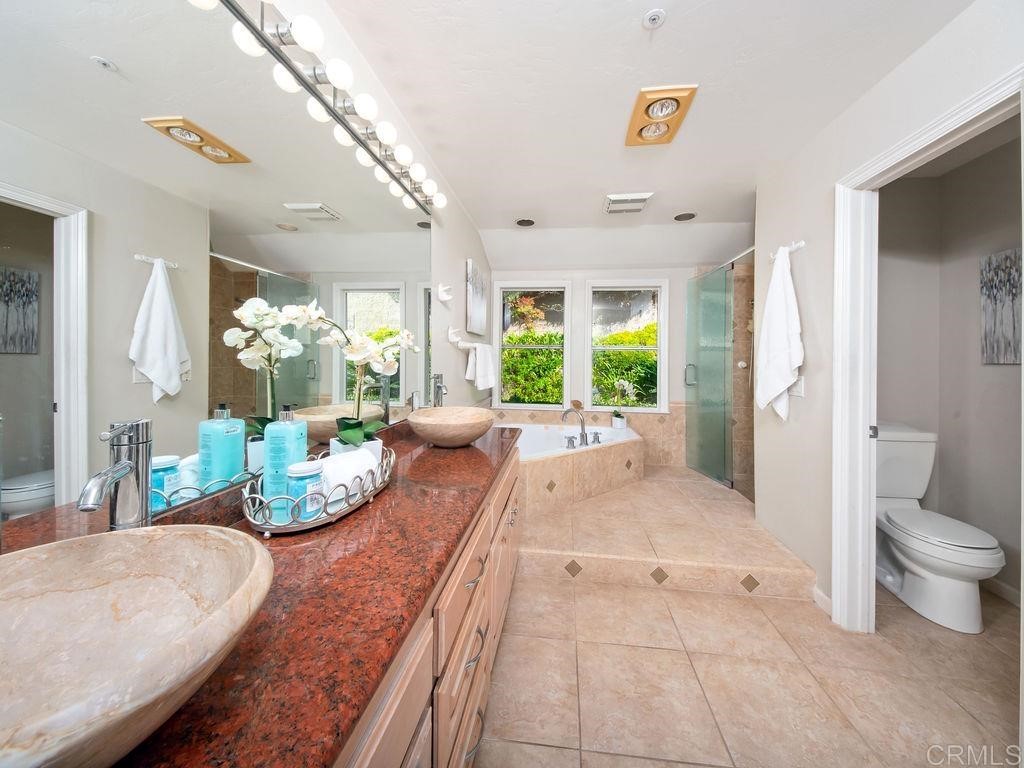 960 Valley Avenue Solana Beach, CA 92075 - Photo 25 of 51 a living room with furniture and a large window