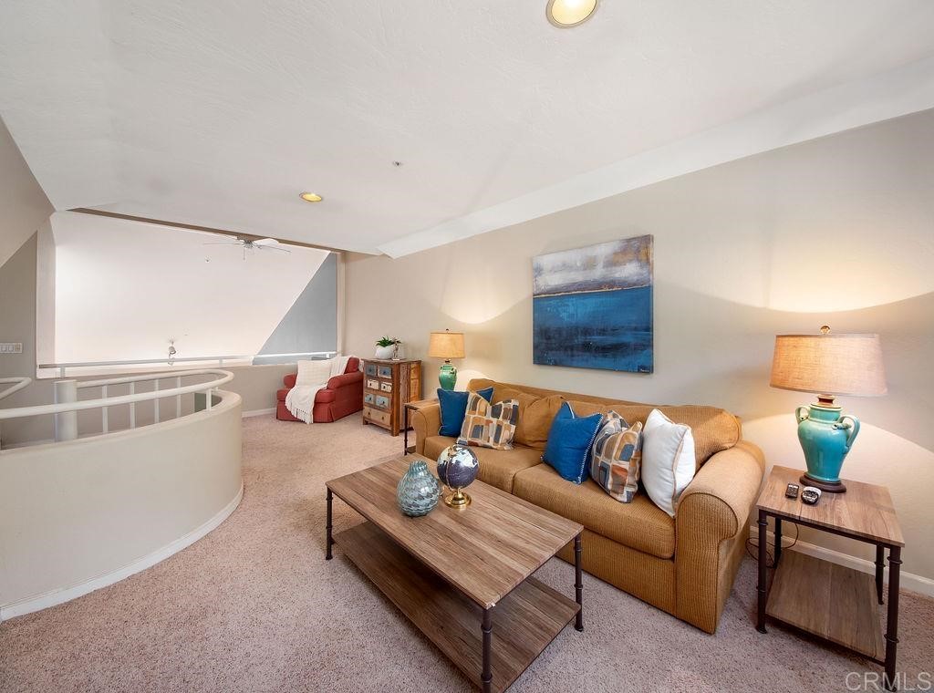 960 Valley Avenue Solana Beach, CA 92075 - Photo 32 of 51 a living room with furniture and white walls