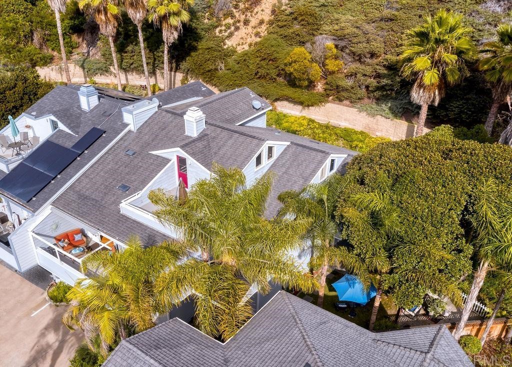 960 Valley Avenue Solana Beach, CA 92075 - Photo 49 of 51 a view of a swimming pool with some potted plants