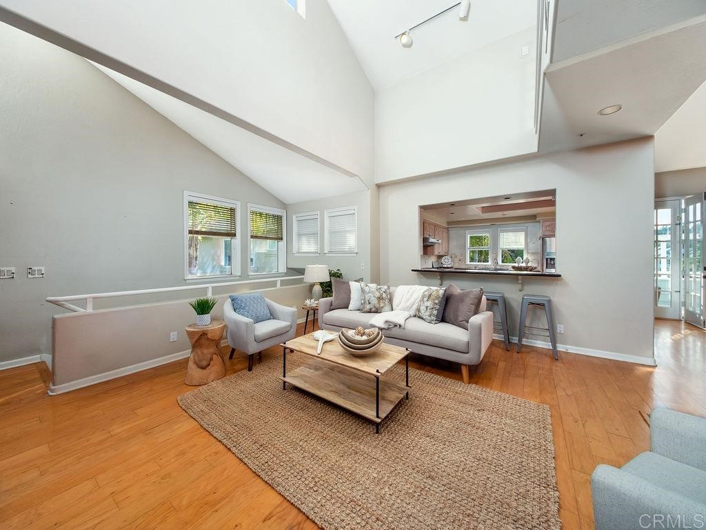 960 Valley Avenue Solana Beach, CA 92075 - Photo 6 of 51 a living room with furniture and a large window