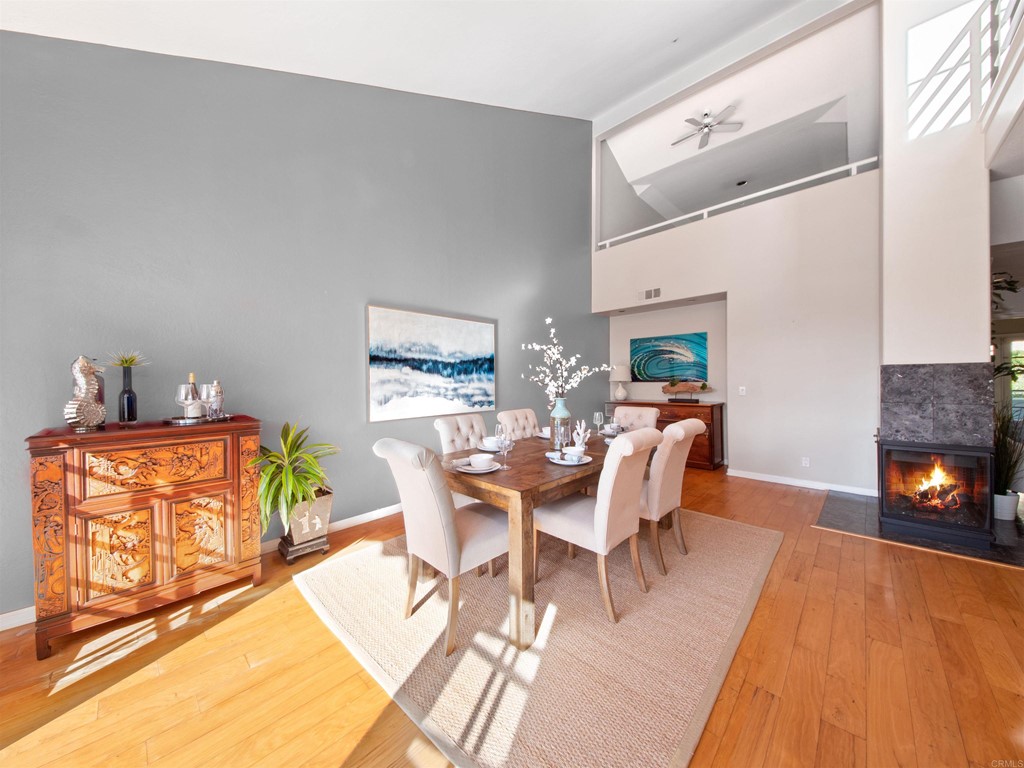 960 Valley Avenue Solana Beach, CA 92075 - Photo 10 of 51 a dining room with furniture and wooden floor