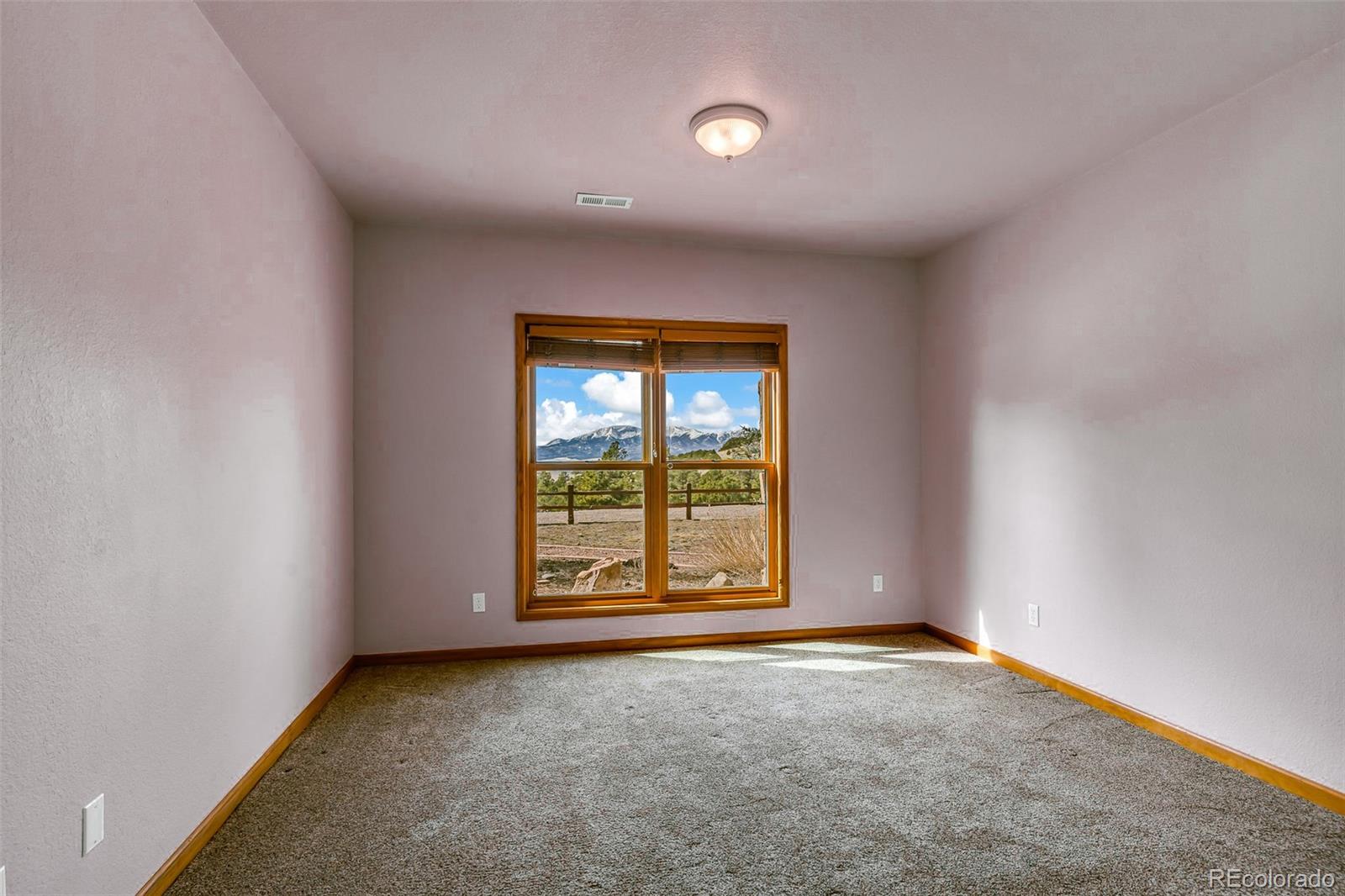4230 Timber Ridge Road Westcliffe, CO 81252 - Photo 20 of 37 an empty room with windows