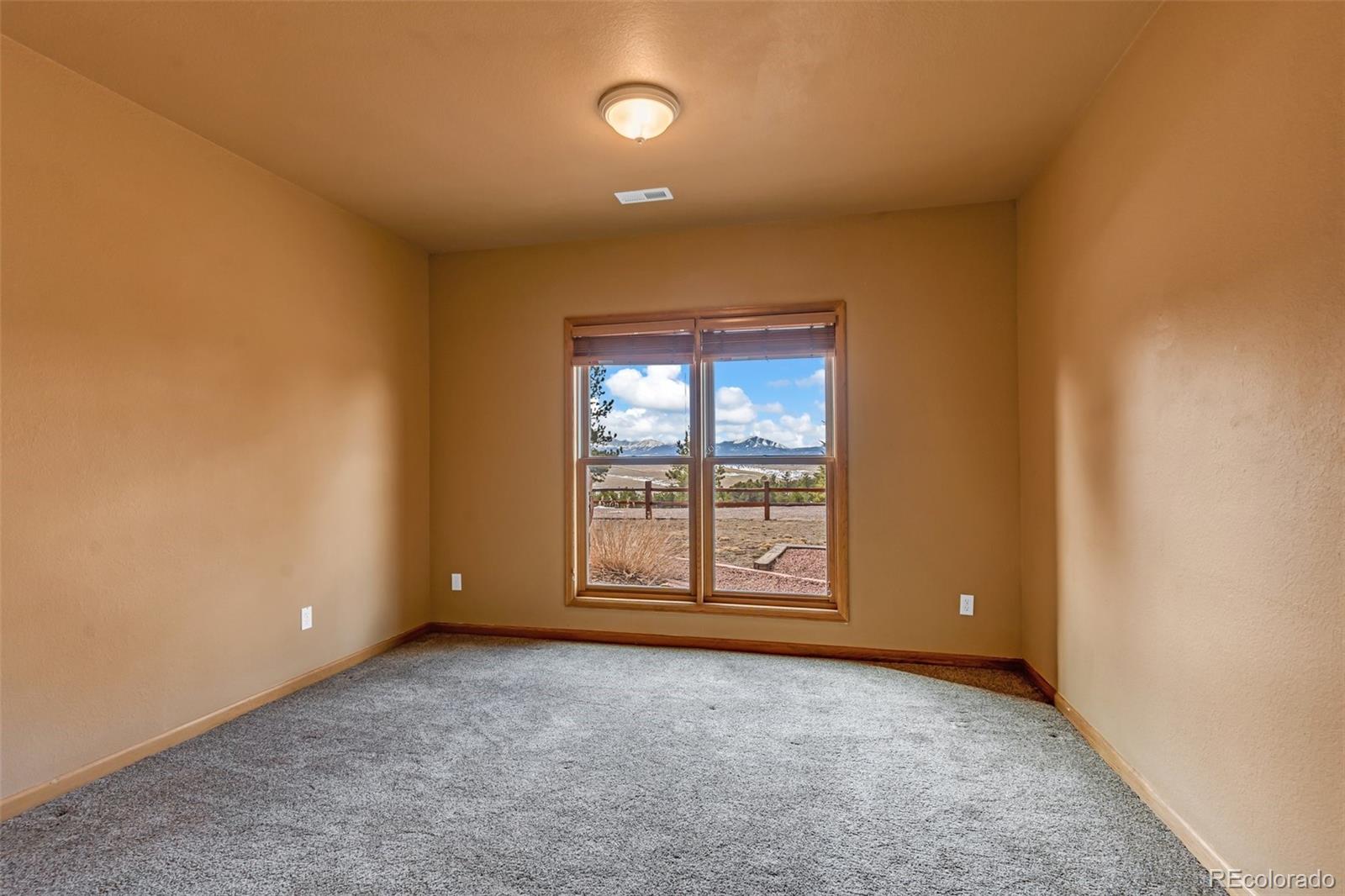 4230 Timber Ridge Road Westcliffe, CO 81252 - Photo 21 of 37 an empty room with windows