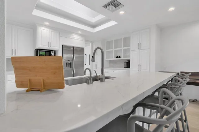 a view of a golf course with a lake view