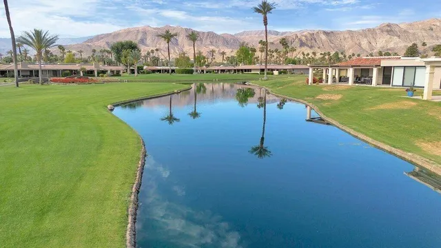 a view of a lake with a big yard