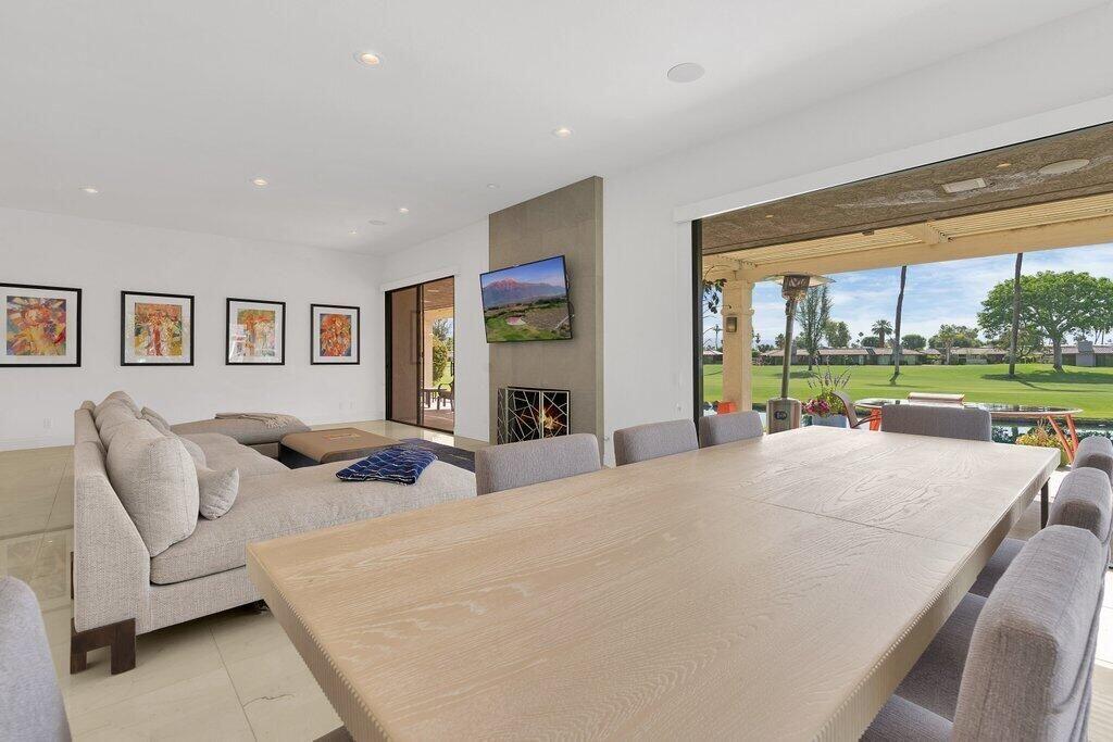 6 Barnard Court Rancho Mirage, CA 92270 - Photo 3 of 50 a bed room with a bed and a large window