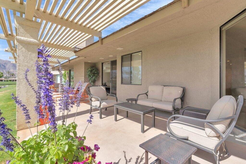 6 Barnard Court Rancho Mirage, CA 92270 - Photo 36 of 50 a outdoor living space with furniture