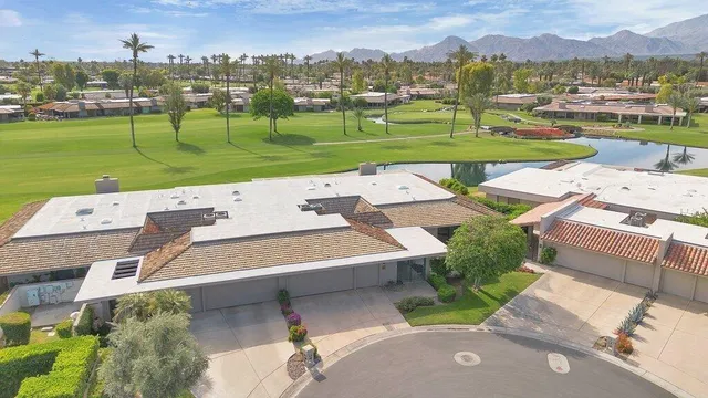 a view of a patio with a yard