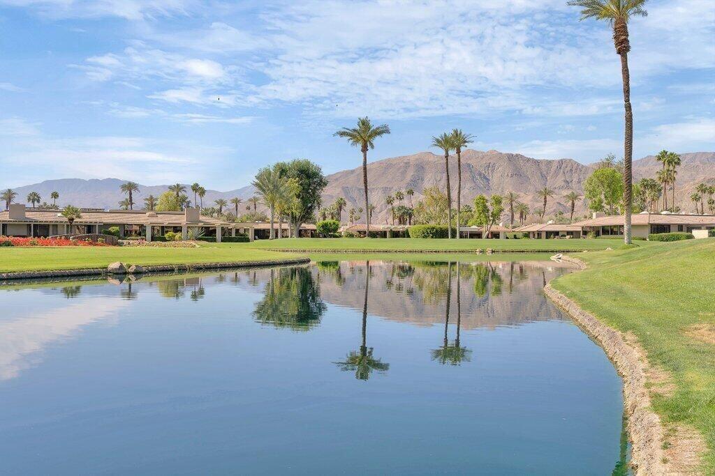 6 Barnard Court Rancho Mirage, CA 92270 - Photo 48 of 50 a view of a lake with a big yard
