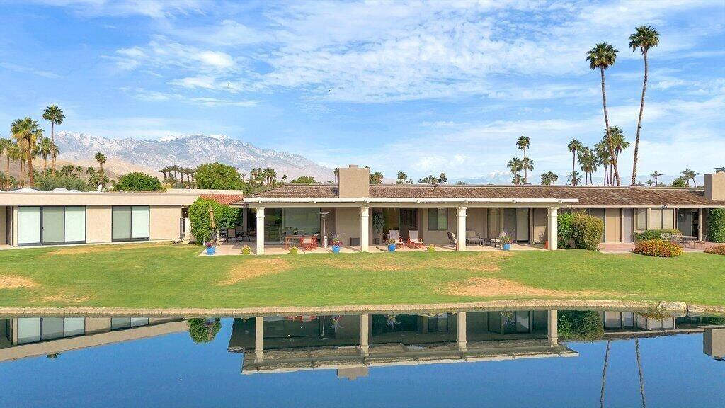 6 Barnard Court Rancho Mirage, CA 92270 - Photo 6 of 50 a view of a house with a swimming pool