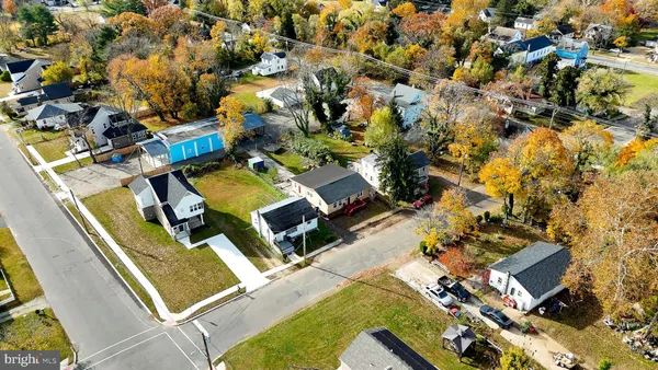 an aerial view of a house with a garden