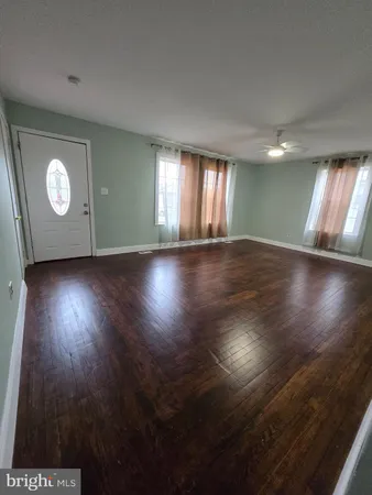 a room with a bed and furniture