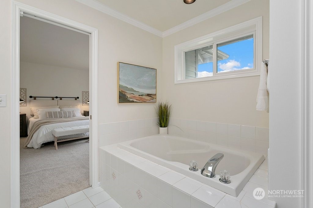 1315 231st Street Southeast Bothell, WA 98021 - Photo 19 of 34 a bathroom with a tub sink and view