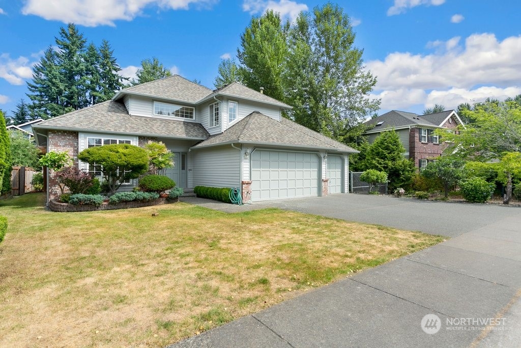 1315 231st Street Southeast Bothell, WA 98021 - Photo 2 of 34 a house with a outdoor space