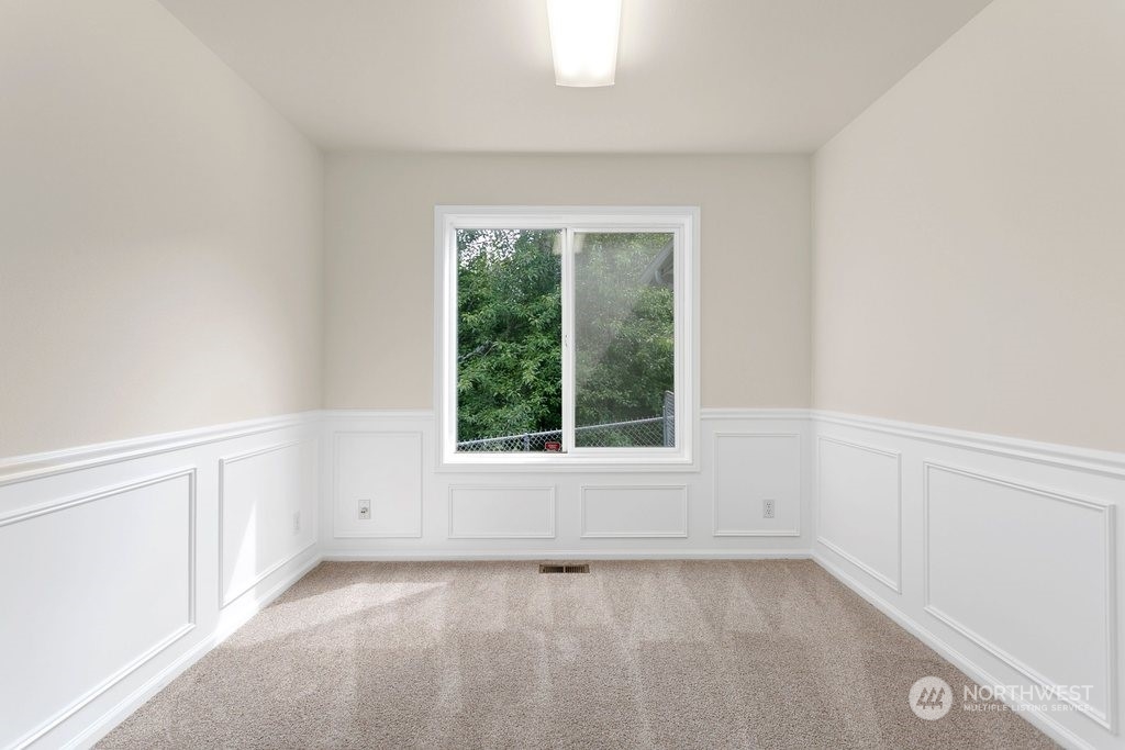 1315 231st Street Southeast Bothell, WA 98021 - Photo 23 of 34 an empty room with a window