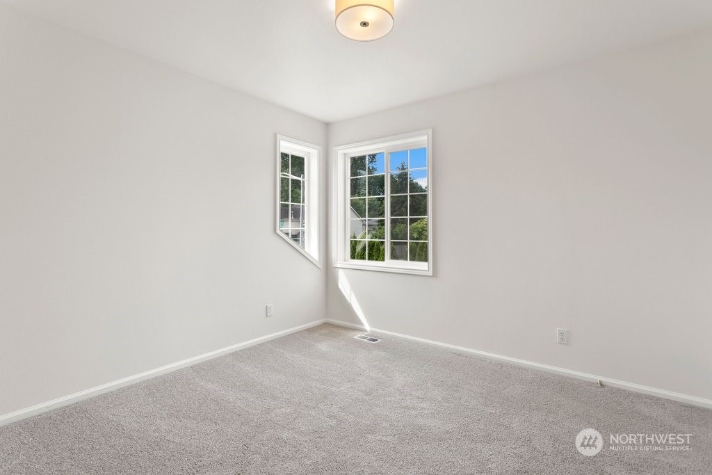 1315 231st Street Southeast Bothell, WA 98021 - Photo 25 of 34 an empty room with windows