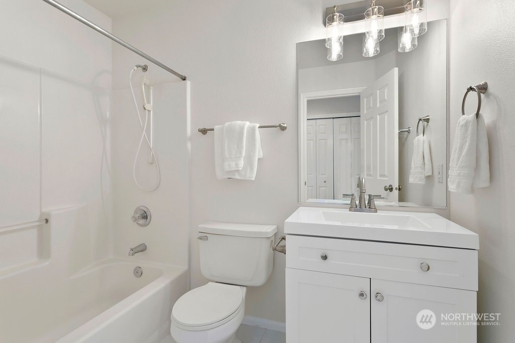 1315 231st Street Southeast Bothell, WA 98021 - Photo 27 of 34 a bathroom with a sink a toilet and shower