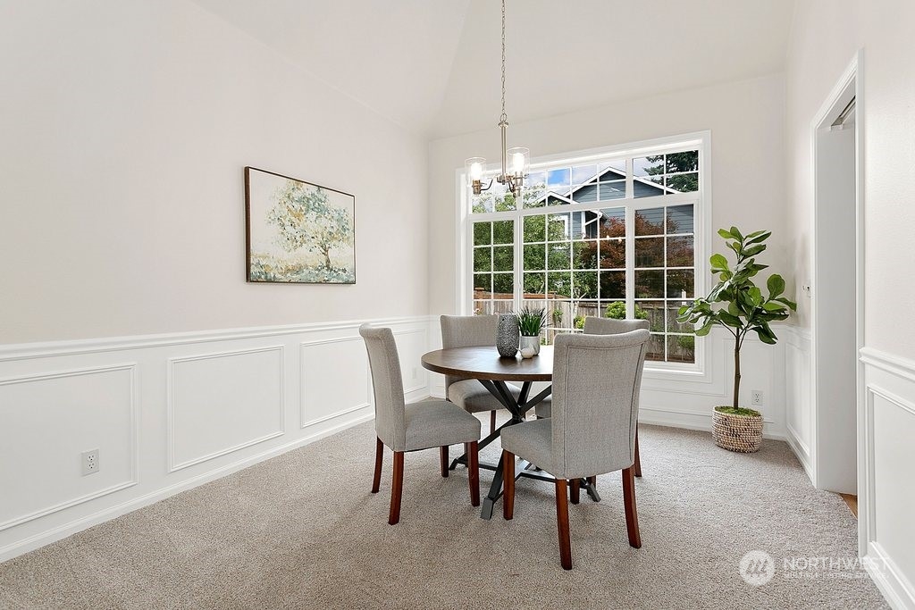 1315 231st Street Southeast Bothell, WA 98021 - Photo 9 of 34 a view of a dining room with furniture and window