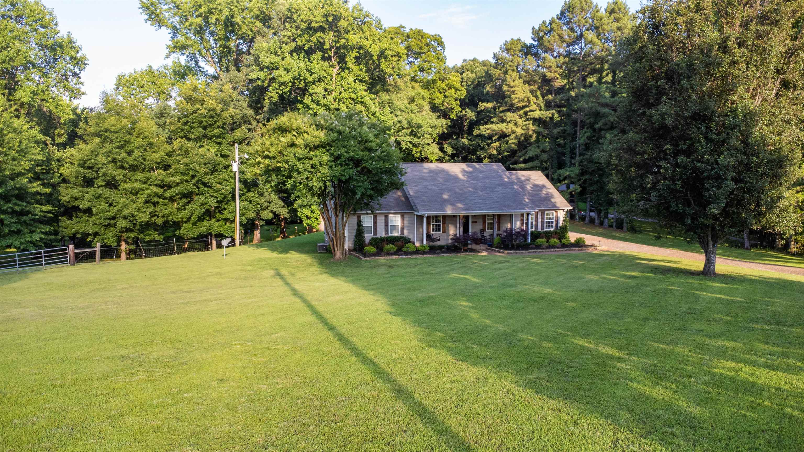 120 Craig Road Ripley, TN 38063 - Photo 35 of 38 Ranch-style residence featuring a covered front porch with white columns