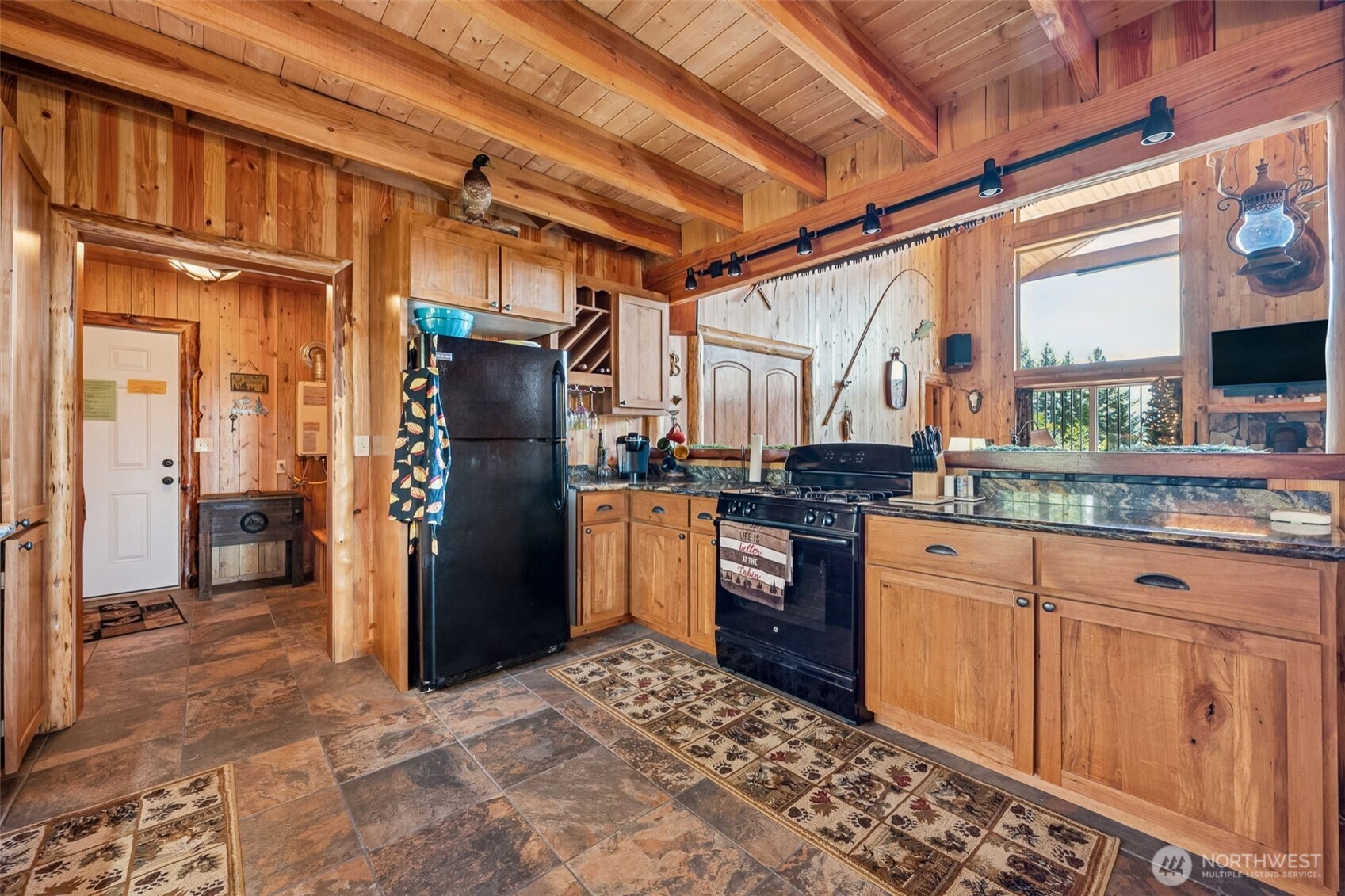 0 Boyd Road Randle, WA 98377 - Photo 11 of 39 a kitchen with stainless steel appliances granite countertop a refrigerator and a stove