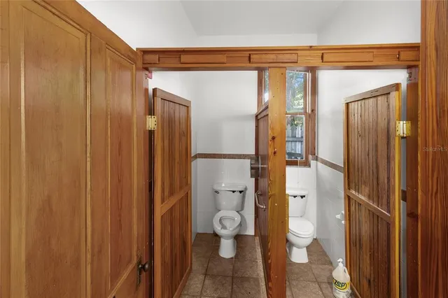a view of balcony with wooden floor