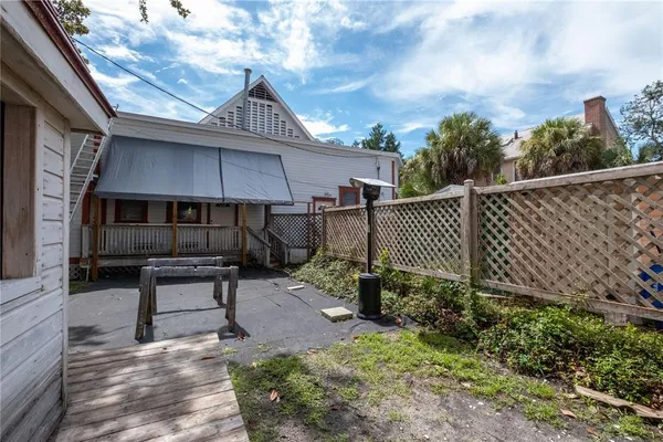 a house view with a garden space