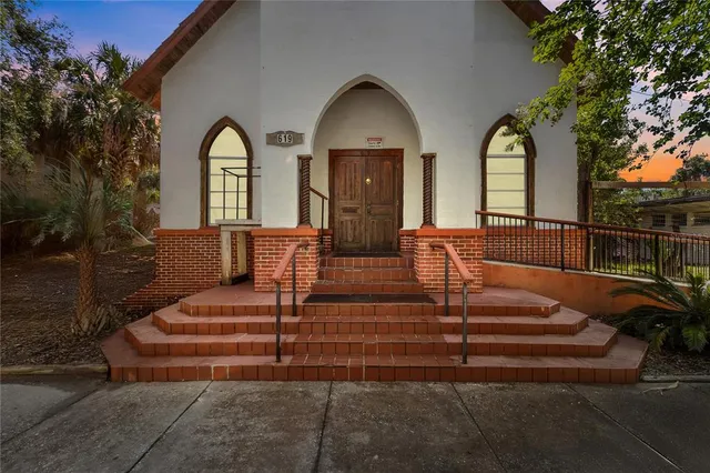 a house view with a garden space