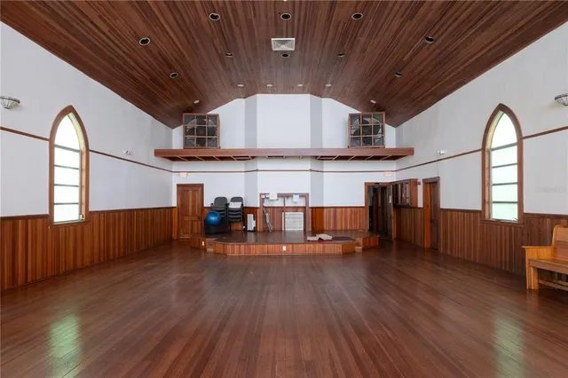 a view of a living room and dining room