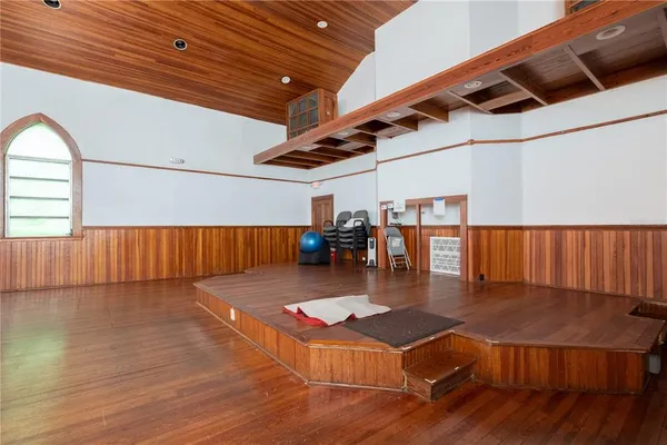 a kitchen with a sink and a stove top oven