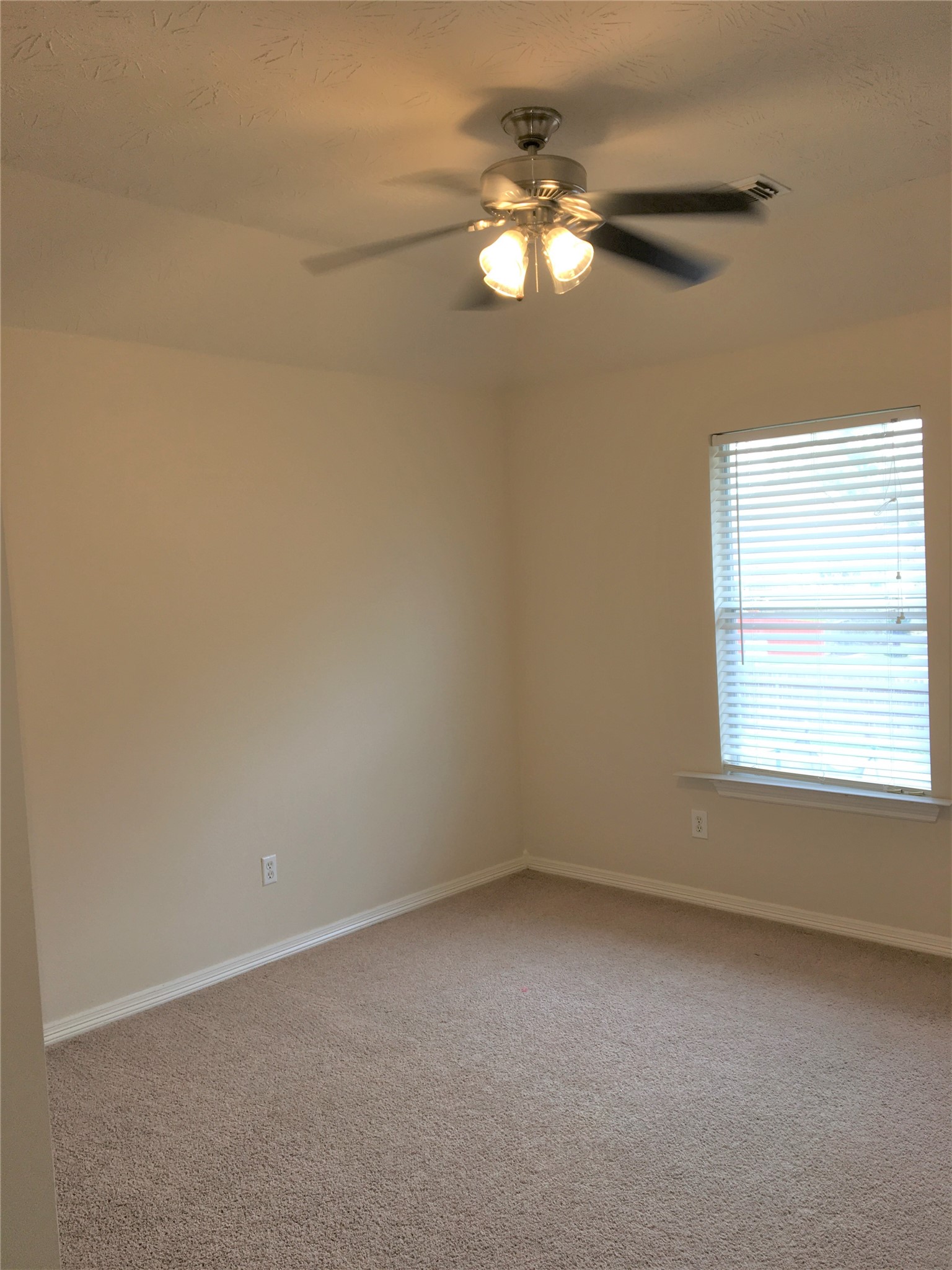 2214 Valley View Crossing Conroe, TX 77304 - Photo 18 of 23 an empty room with a window