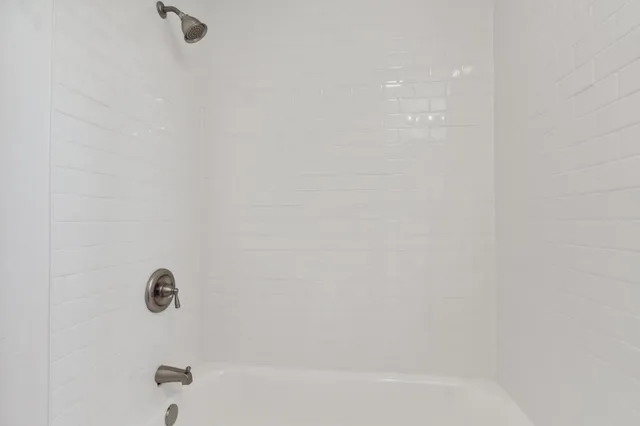 a bathroom with a sink and a bathtub