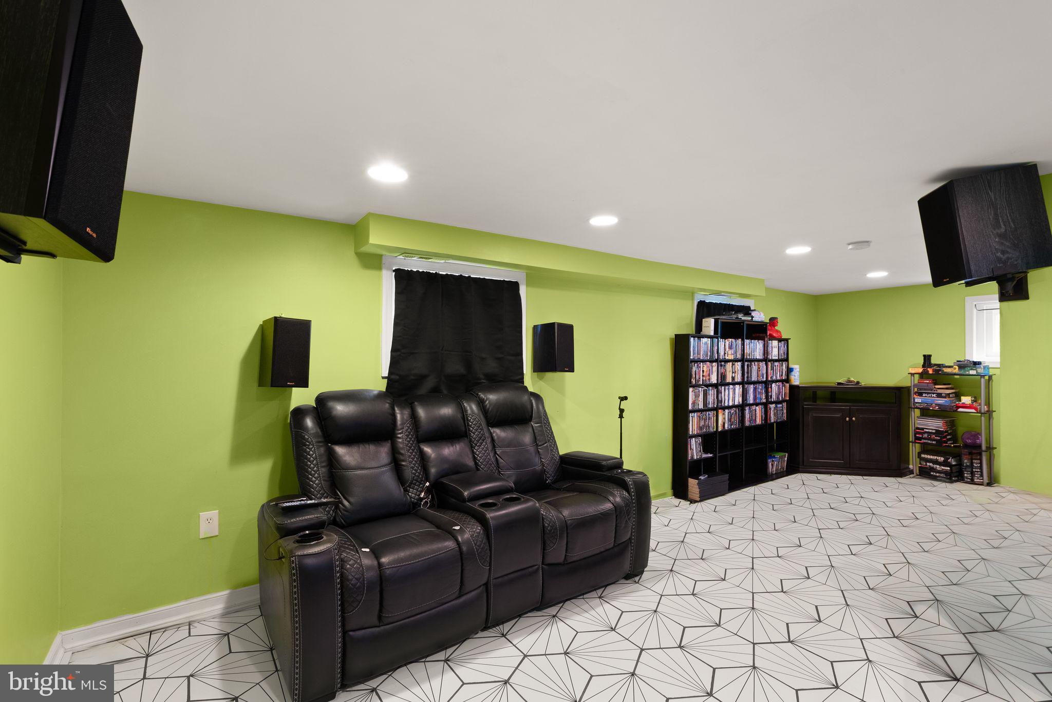 14501 Livingston Road Accokeek, MD 20607 - Photo 14 of 32 a living room with furniture and a flat screen tv