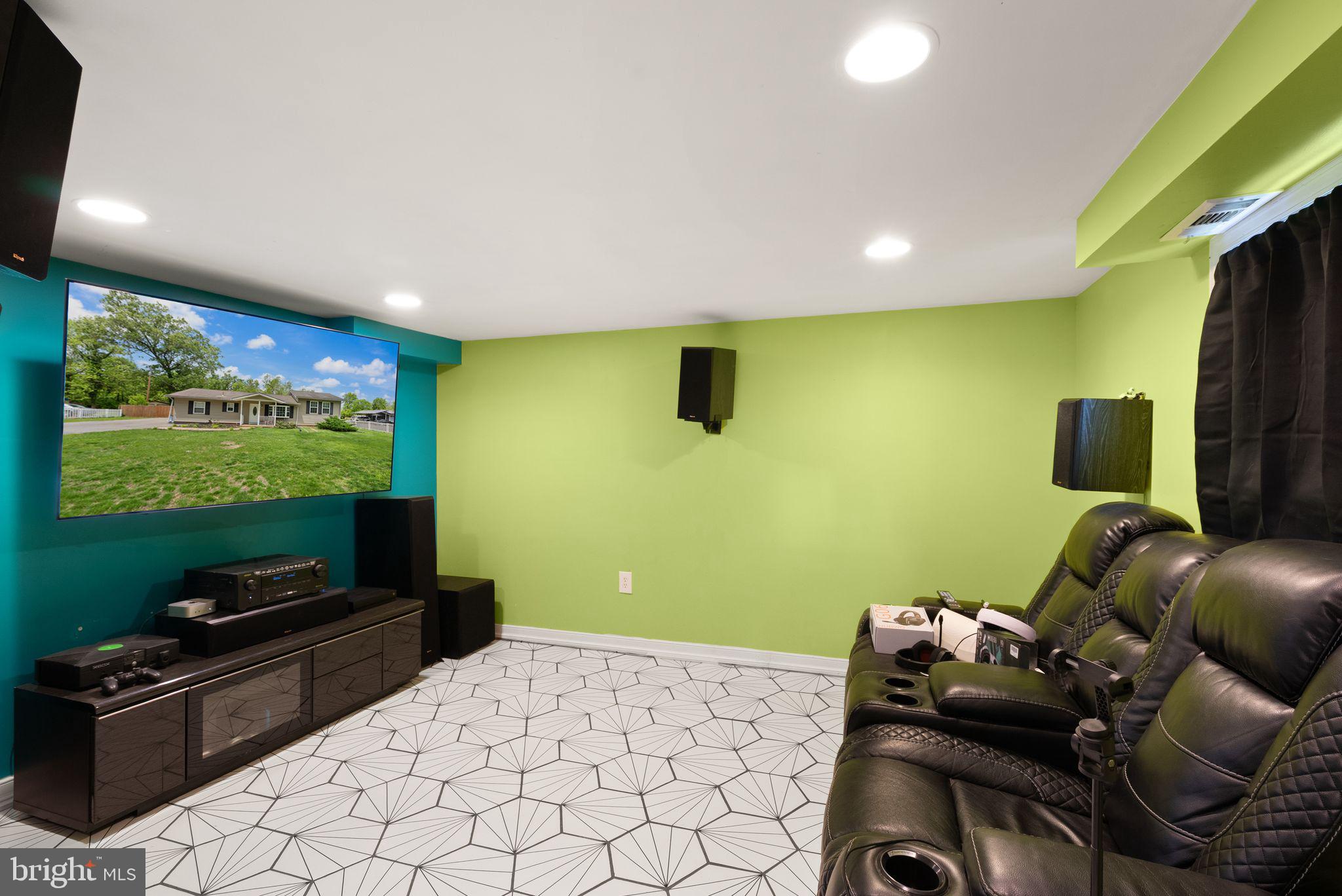 14501 Livingston Road Accokeek, MD 20607 - Photo 15 of 32 a room with furniture and a flat screen tv