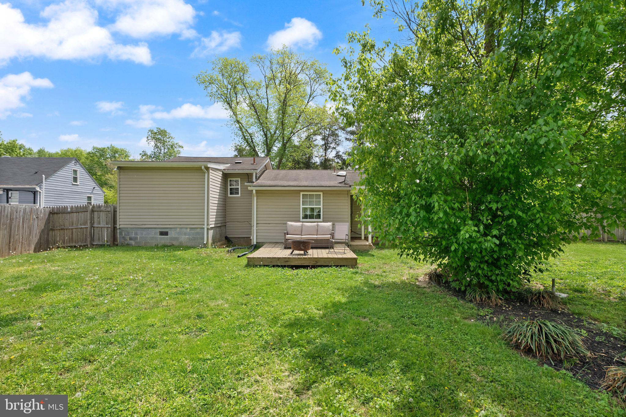 14501 Livingston Road Accokeek, MD 20607 - Photo 24 of 32 a view of a house with backyard and a garden