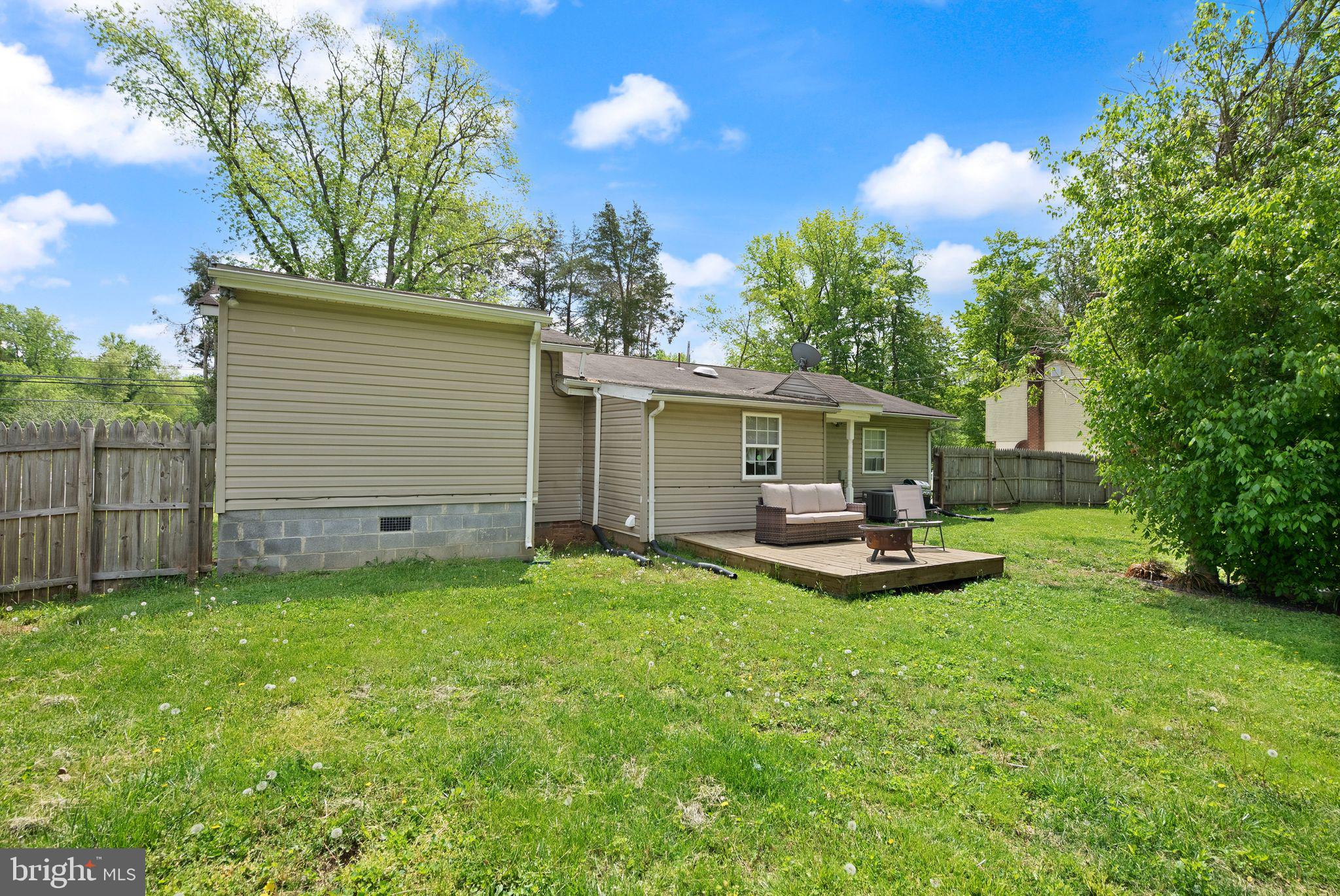 14501 Livingston Road Accokeek, MD 20607 - Photo 27 of 32 a view of a house with backyard and sitting area