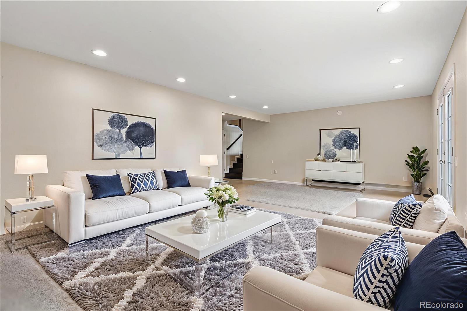 3301 South Magnolia Street Denver, CO 80224 - Photo 13 of 33 a living room with furniture and wooden floor