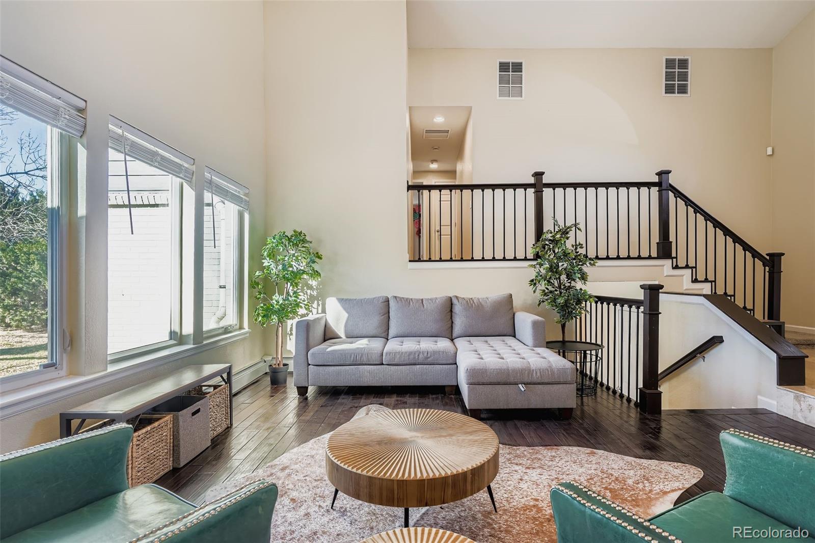 3301 South Magnolia Street Denver, CO 80224 - Photo 16 of 33 a living room with furniture fireplace and a window