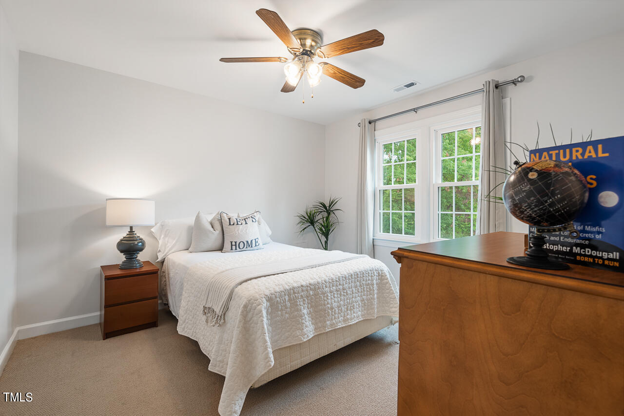 5 Caspian Court Durham, NC 27713 - Photo 33 of 48 a bedroom with bed and window