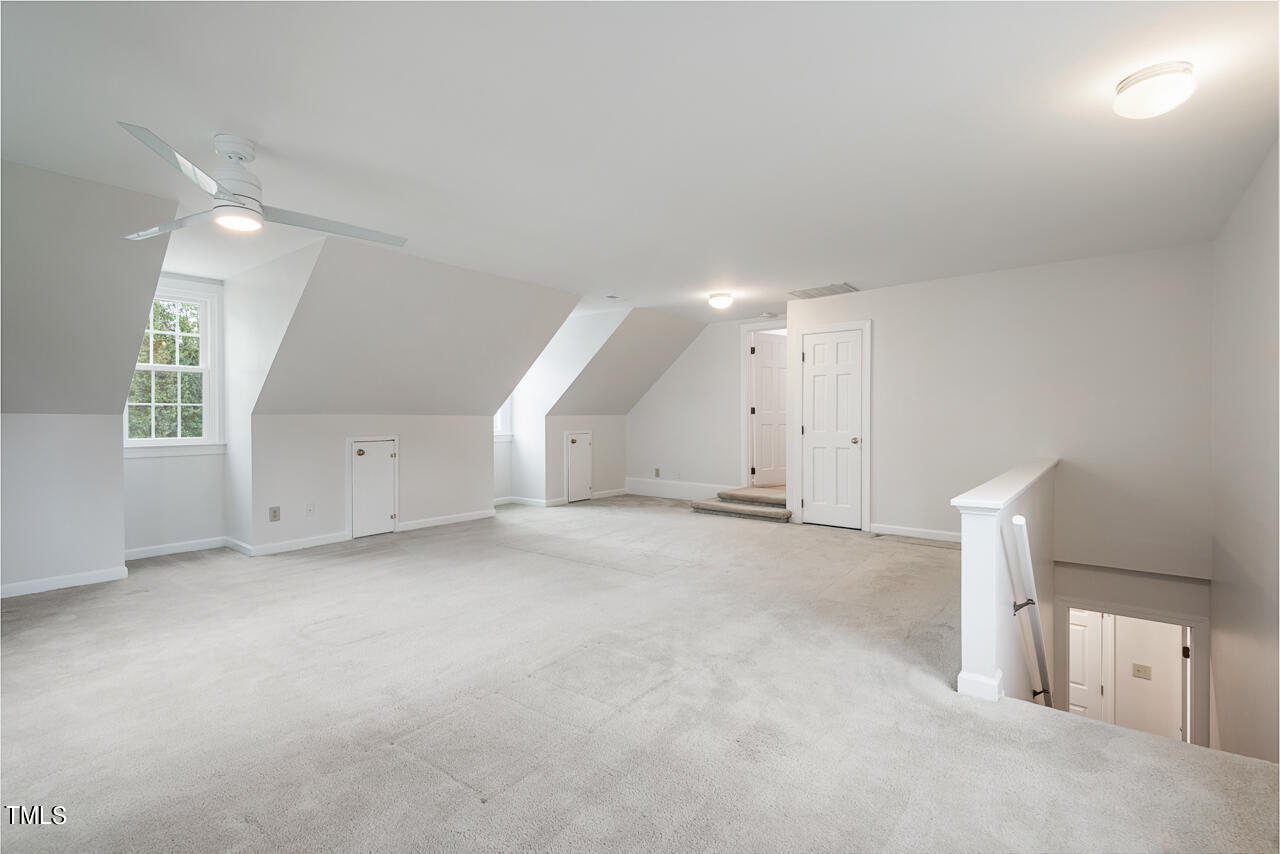 5 Caspian Court Durham, NC 27713 - Photo 35 of 48 an empty room with a window and a fireplace