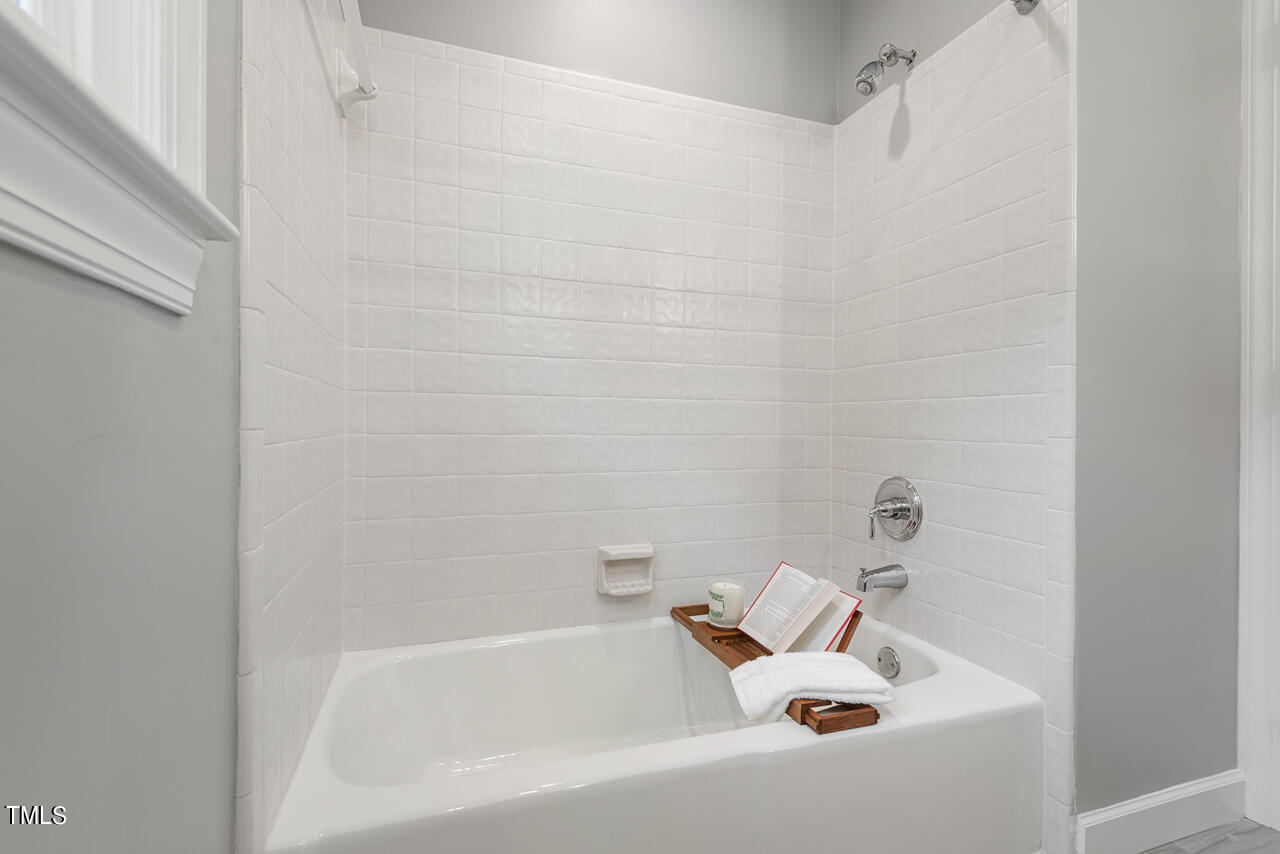 5 Caspian Court Durham, NC 27713 - Photo 37 of 48 a bathroom with a bathtub