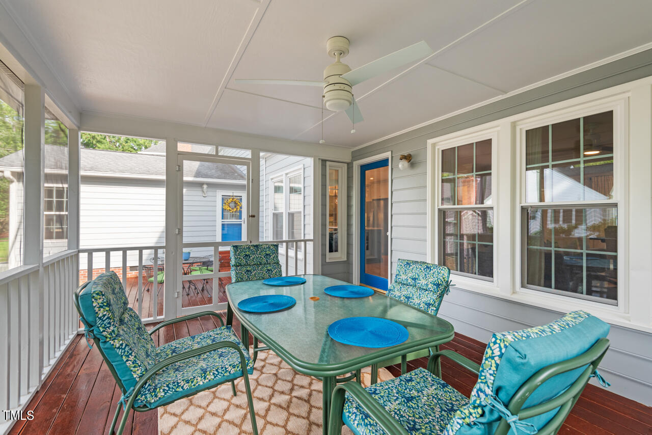 5 Caspian Court Durham, NC 27713 - Photo 40 of 48 a view of a dining room with furniture window and wooden floor